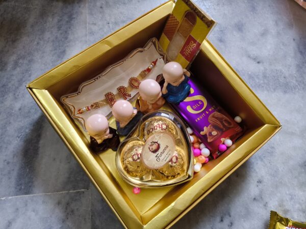 Brothers Rakhi with combination of Buddh statue And Dairy Chocolates