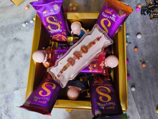Exclusive Rakhi Gift Hamper for Brother with “BRO” Rakhi, Silk Chocolates & Monk Set
