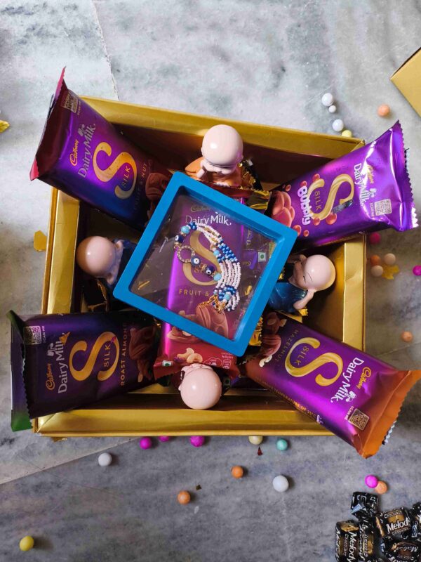 Luxury Rakhi Gift Hamper with Silk Chocolates, Monks & Bracelet Rakhi – Golden Box